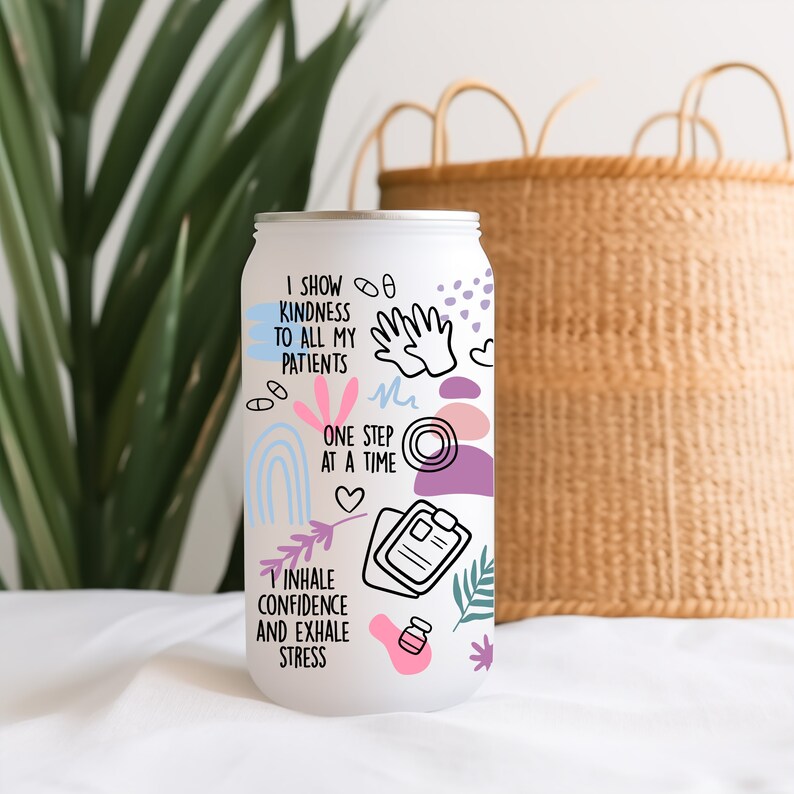 May include: White insulated tumbler with a colorful design and text that reads "I show kindness to all my patients, one step at a time, inhale confidence and exhale stress".