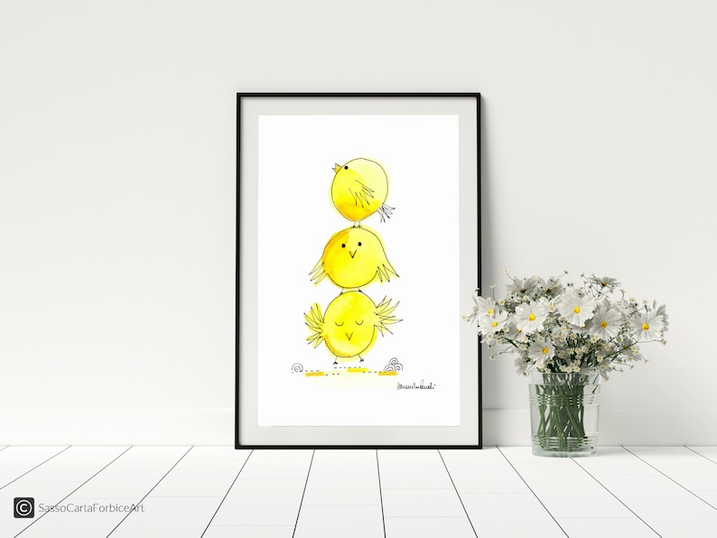 May include: A watercolor painting of three yellow chicks stacked on top of each other. The chicks are drawn in a simple, cartoon style with black outlines. The background is white.