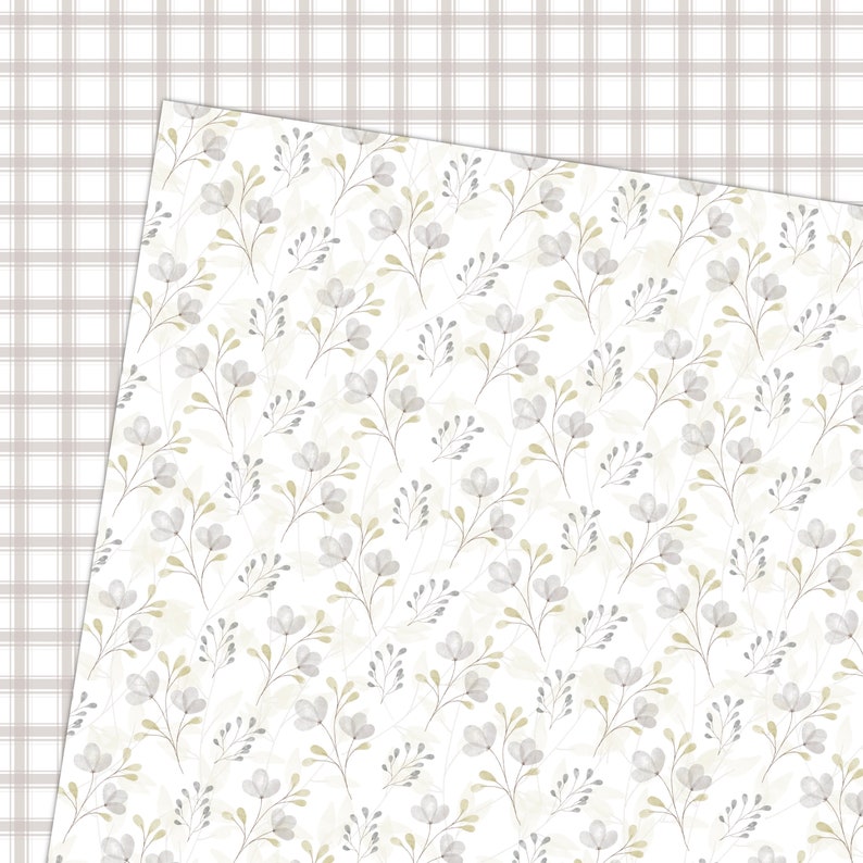 Peut inclure: Un motif sans couture avec de d&eacute;licates fleurs et feuilles en aquarelle grises et vertes sur un fond blanc.