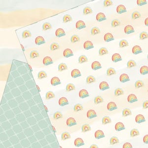 May include: A white background with a repeating pattern of colorful rainbows with the word "one" written on each rainbow. The rainbows are painted in shades of yellow, orange, red, blue, and green.