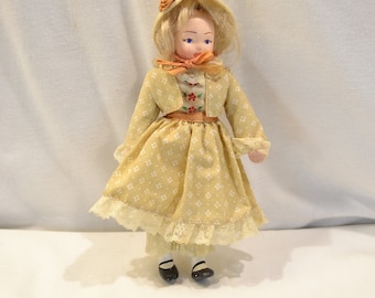 House of Hatten porcelain doll, prairie baby doll, beige dress, bonnet, blonde hair, 8" tall