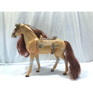 Vintage toy horse, palomino yellow with red mane and tail, 10&quot; length, saddle
