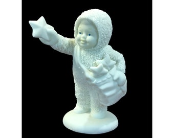 Dept 56 Snowbabies angel figurine with star filled bag, white snow angel baby, 4" tall