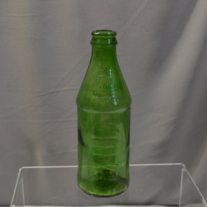 Vintage 7-up bottle, clear green glass embossed soda bottle
