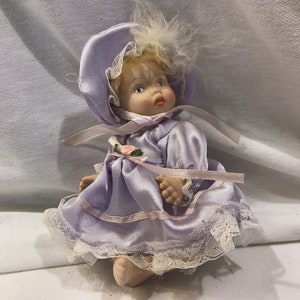 Vintage small baby doll, purple dress infant doll, 6 inch, bisque
