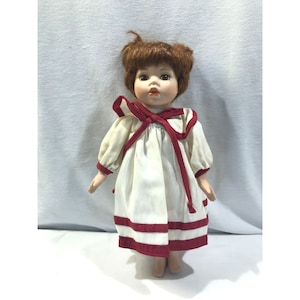Vintage porcelain doll, Collectors Choice 12&quot; collectible baby doll, brown red hair, red white dress