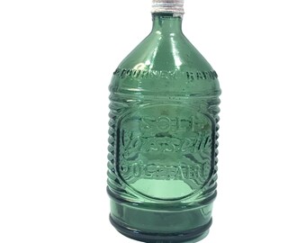 Soli Vaisselle French dishwashing liquid bottle, vintage green glass bottle, ribbed, with rubber ball, 1950s France