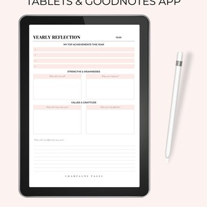 May include: A digital tablet displaying a yearly reflection planner template with sections for top achievements, strengths and weaknesses, values and gratitude. The template is designed for use with the Goodnotes app.