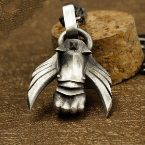 Winged fist, winged pendant, iron fist pendant, iron hand, power move, men&#39;s power jewelry, masculine symbol necklace, unique men&#39;s necklace