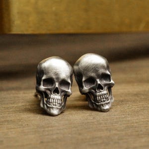 3D relief smiling skull earrings, evil smile, charming skull earrings, unisex skull earrings, symbol of rebirth, skull helmet earrings