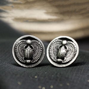 Ancient Egyptian scarab earrings, scarab totem earrings on a disk, religious emblems, symbolic jewelry, protection amulet insect
