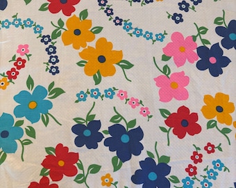 Vintage bright flower on white pique cotton fabric remnant.