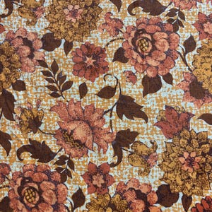 Vintage 1970’s brown and orange floral cotton fabric. Two pieces  17” x 20 1/2”