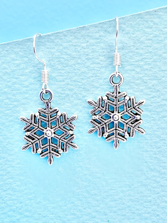 Dangling snowflake earrings sale