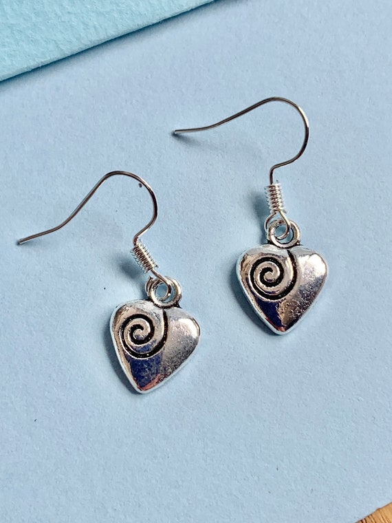 Cute silver dangle earrings discount