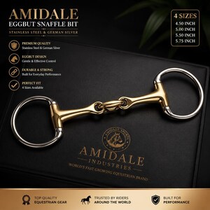 May include: An Amidale eggbut snaffle bit made of stainless steel and German silver. The bit features a gold-toned mouthpiece with silver-toned rings. Text on the image lists four available sizes: 4.50 inch, 5.00 inch, 5.50 inch, and 5.75 inch.
