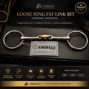May include: A silver-coloured loose ring horse bit with a central copper lozenge link. The product features a white tag with the text AMIDALE and includes size options of 5.00 inches, 5.50 inches, and 5.75 inches printed on the packaging.