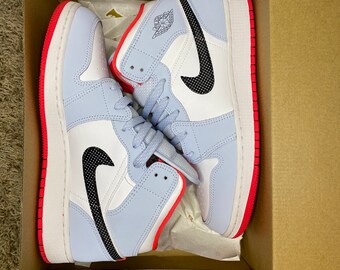 half blue polka dot swoosh 1s