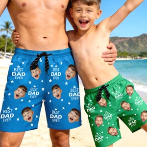 May include: A white ceramic mug with a black handle and the text "But First, Coffee" in a bold, black font. The mug is set against a neutral background, highlighting its simple design.