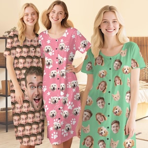 May include: Three button-down nightgowns with short sleeves. One gown is covered in faces, another in dog faces and paw prints, and the third in faces and cat faces. The gowns are in shades of pink and green.