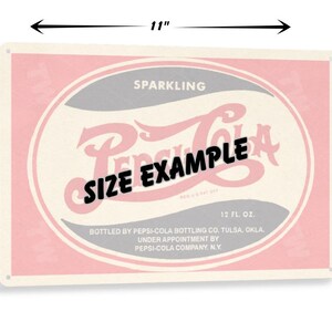 May include: A rectangular metal sign featuring a vintage Pepsi-Cola design. The sign is 11 inches wide and 8 inches tall. The design includes the Pepsi-Cola logo in red, with the words "Sparkling" and "12 fl. oz." The text "SIZE EXAMPLE" is also present.