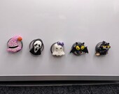 Black cat on broom, scream, witch hat, ghost with bow, and vampire bat magnets