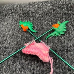 Stegosaurus knitting needle point protectors size 2.5