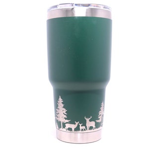 30oz - 360 Deer in pine tree wrap Laser engraved on a Yeti tumbler with magslide lid. These are NOT sticker’s or vinyl decals!