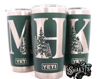 Single letter Pine tree monogram laser or hand engraved on a 20oz Yeti tumbler. Dishwasher safe.... These are NOT sticker’s or vinyl decals!
