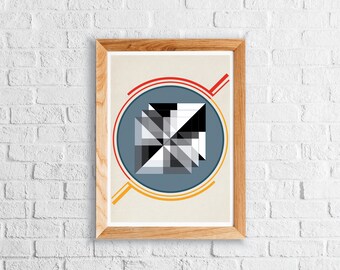 May include: A framed print with a geometric design featuring a black and white square shape in the center, surrounded by a blue circle with red and yellow rings. The background is a light beige color.