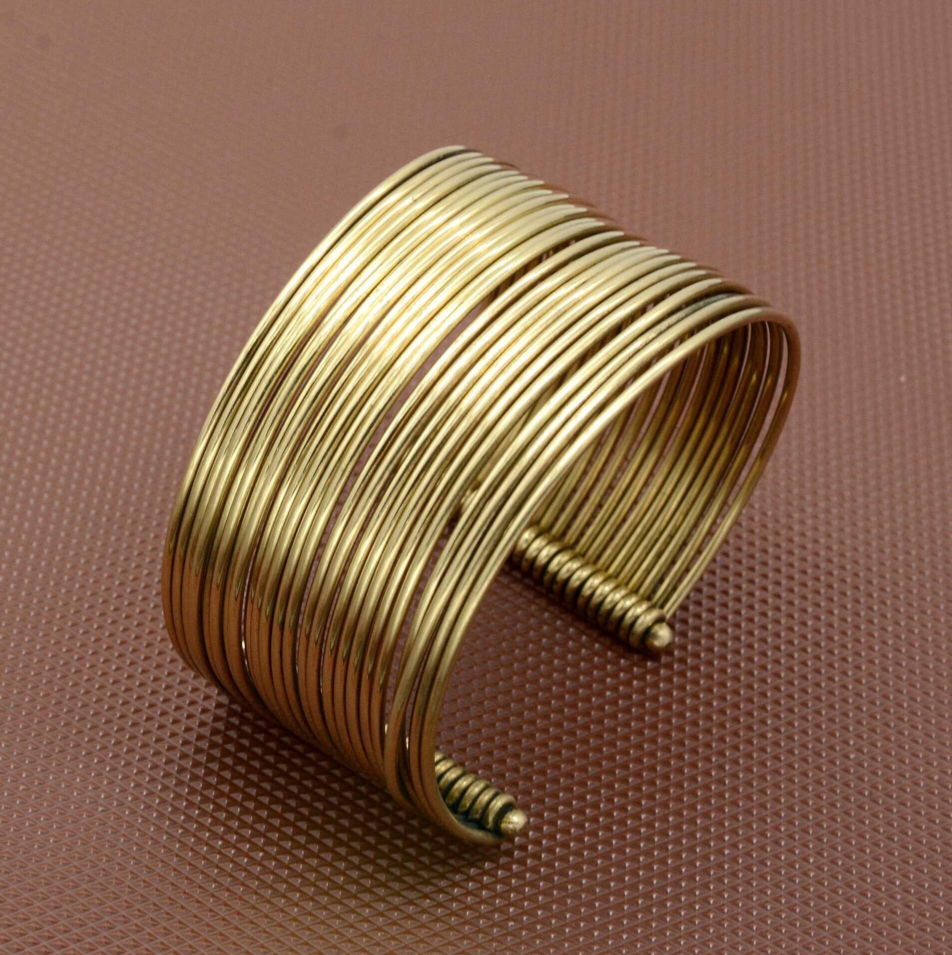 Bracciale rigido donna di tendenza faschion in oro giallo 18kt