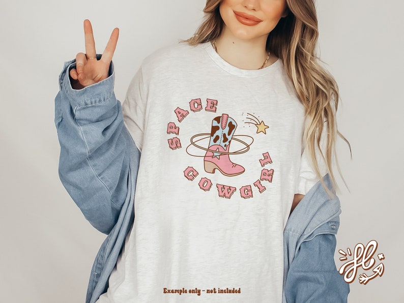 May include: White t-shirt with a pink cowboy boot graphic and the text "Space Cowgirl" in a retro font.