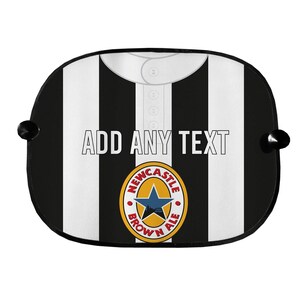 May include: Black and white striped sunshade with the text "ADD ANY TEXT" and a Newcastle Brown Ale logo. The sunshade has a white collar and button detail.