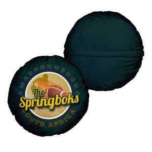 May include: Round pillow with a dark green background and a yellow circle with the text "The Springboks South Africa" and a silhouette of a rugby player running with a football.