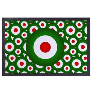 May include: A framed print of a repeating pattern of green, white, and red circles. The circles resemble a target or bullseye.