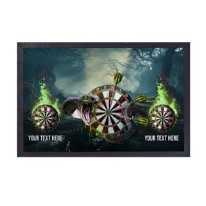 May include: A dartboard with a green and black snake wrapped around it. The snake's head is open and its fangs are visible. The dartboard is set against a dark green and black background with green flames on either side. The text "YOUR TEXT HERE" is printed on the bottom of the image.