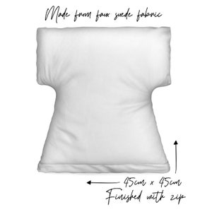 May include: White cushion cover made from faux suede fabric. The cushion is 45 inches by 45 inches and has a zipper closure. "Made from faux suede fabric" and "Finished with zip" are written on the image.