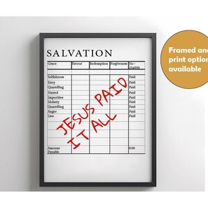 May include: A black framed print with a white background and a table with the word "SALVATION" at the top. The table has columns labelled "Grace", "Favour", "Redemption", "Forgiveness", and "No." The table lists various sins and the word "Paid" is written next to each sin. The words "JESUS PAID IT ALL" are written diagonally across the table in red.