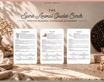 May include: Three white rectangular cards titled The Spirit Animal Guides Cards, featuring The Elephant, The Lion, and The Owl. Each card contains text sections for characteristics, symbolism, guidance, numerology, color, zodiac, planet, and element.