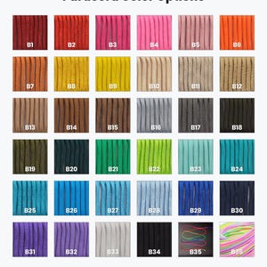 a collection of 24 different colored paracord strings, each with a unique color option. The strings are arranged in a grid format, with four rows and six columns, showcasing a variety of colors and patterns.
