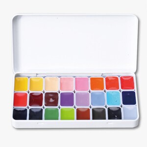 May include: A white metal paint palette with 20 watercolor paint pans. The pans are arranged in four rows of five. The colors include yellow, orange, red, pink, purple, blue, green, brown, black, and white.