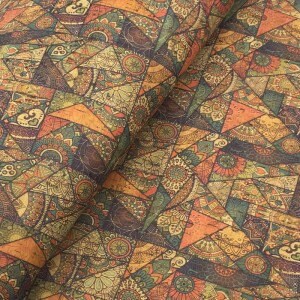 May include: Multicoloured fabric with a geometric pattern of triangles and circles. The fabric has a textured, cork-like surface.