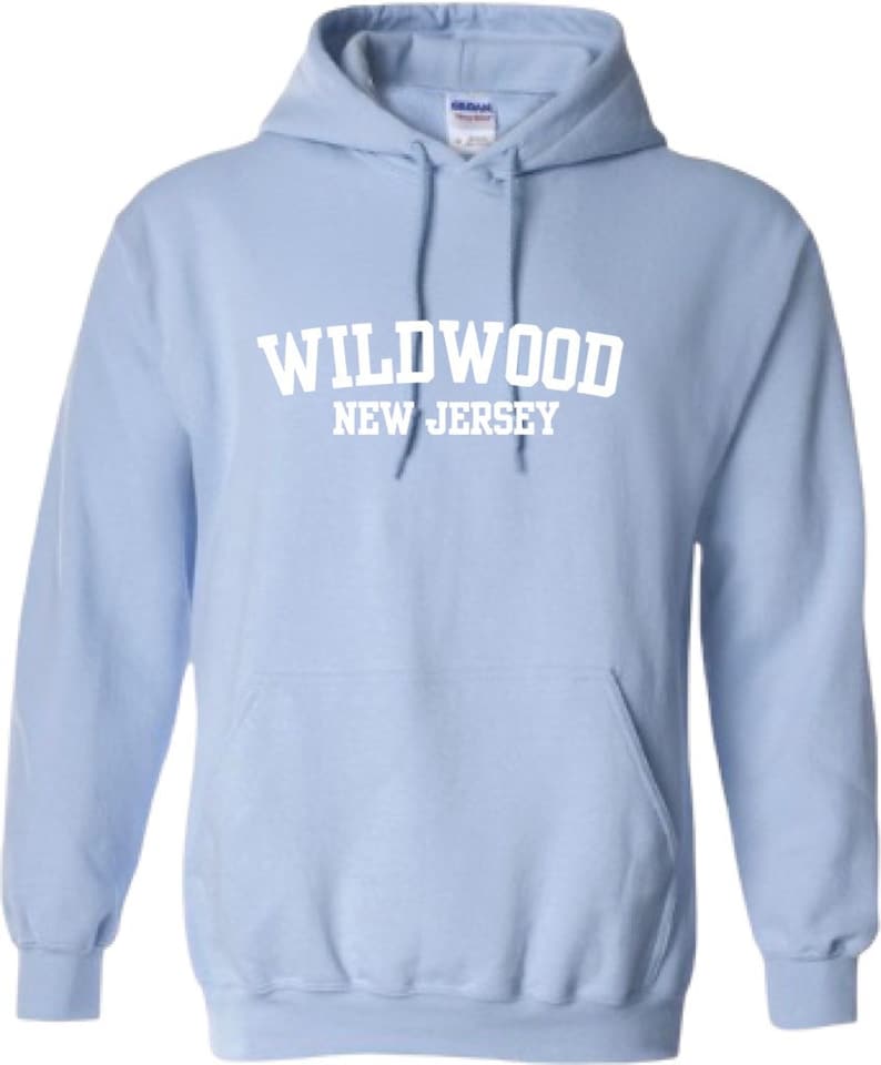 May include: Light blue hooded sweatshirt with white text that reads "WILDWOOD NEW JERSEY".