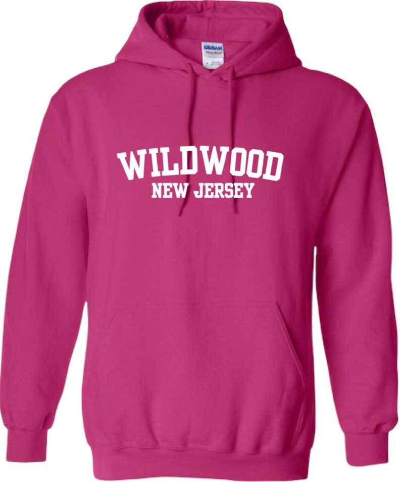 May include: A pink hooded sweatshirt with the text "WILDWOOD NEW JERSEY" in white.