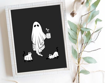 May include: A black and white illustration of a ghost holding a coffee mug that says "Cat Lover". There are three white cats in the image.