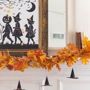 Printable DIY witch hat banner, Halloween paper garland, spooky witch hat pattern, witch hat printable craft, Halloween party decor idea, witchy garland decoration printable, Halloween witch hat cutout, DIY paper witch hat printable, cute witch hat home decor, printable Halloween project