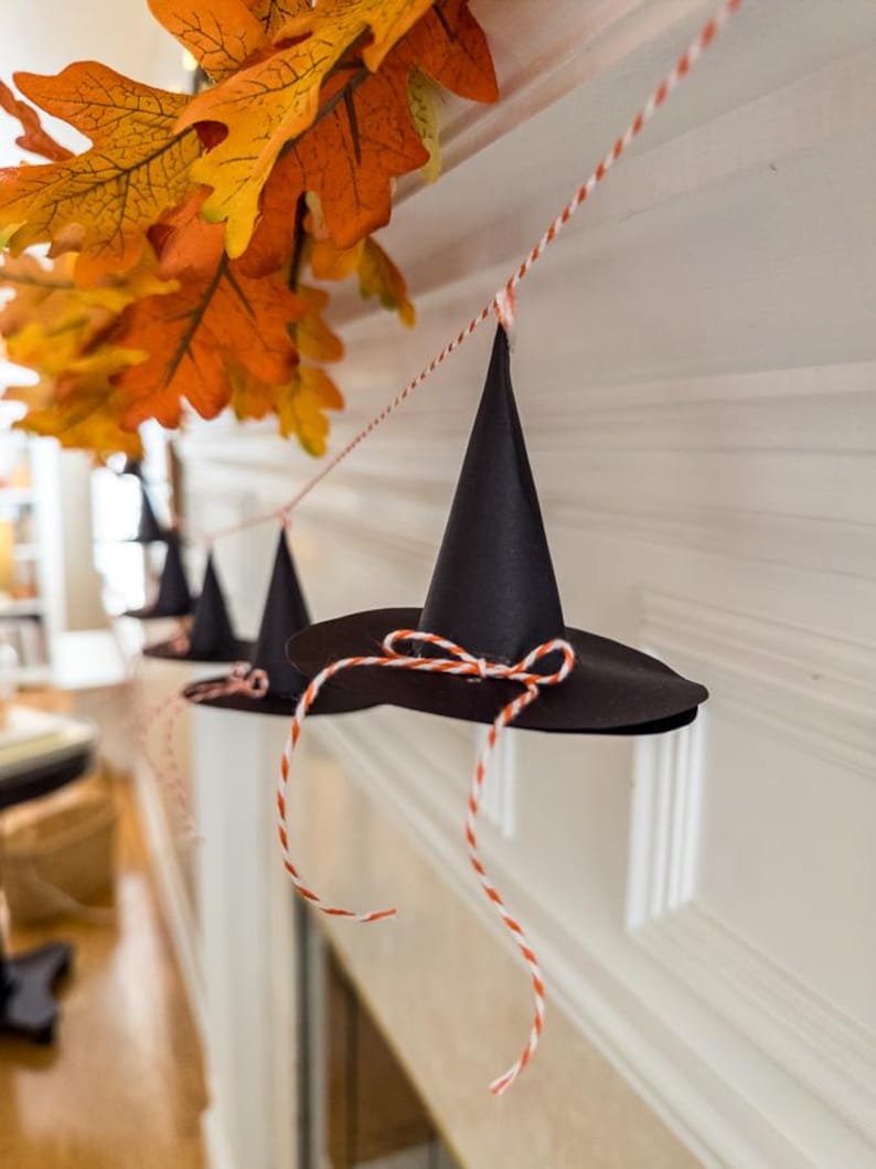 Printable mini witch hat, witch hat pattern template, Halloween witch craft, spooky witch paper hat, printable party garland, witch hat paper cone DIY, Halloween decoration printable, mystical witch party decor, handmade Halloween witch hat, witch hat cutout printable