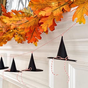Halloween witch hat garland printable, spooky witch paper craft, witch hat printable for party, DIY witch hat decor, Halloween printable decorations, witch hat art banner, paper Halloween DIY craft, printable Halloween paper hat, mini witch hat template, witchy Halloween DIY