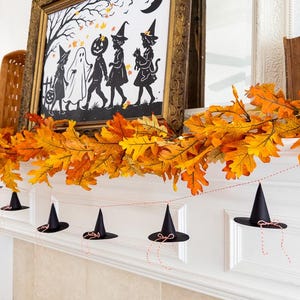 Halloween paper witch hat printable, witch hat garland banner, DIY witchy Halloween decor, spooky hat party craft, printable witch cone hat, mini witchy decorations, witch hat paper DIY pattern, Halloween witch garland template, mystical Halloween decor, printable Halloween hat
