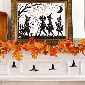 Printable DIY witch hat, witchy Halloween banner, spooky witch hat decor, Halloween paper garland printable, DIY Halloween hat pattern, mini witch hat craft, witch hat wall decor printable, paper cone hat Halloween project, witch hat template PDF, Halloween decor printable
